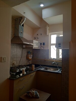 Kitchen in 1 BHK Apartment at Paras Tierea, Sector 137 – for Sale