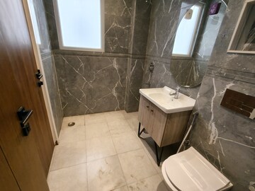 Bathroom in 4 BHK Apartment at Ansal API Versalia, Sector 67a – for Rent