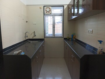 Kitchen in 2 BHK Apartment at Cosmos Classique, Ghodbunder Road – for Rent