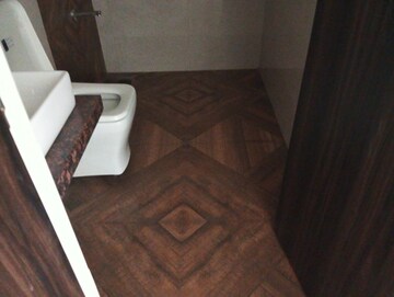 Bathroom in 2 BHK Apartment at Shree Tirupati STG Signature Residency, Patlipada – for Rent