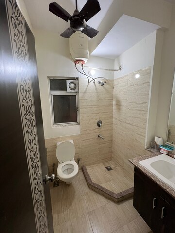Bathroom in 3 BHK Apartment at Moti Nagar – for Rent