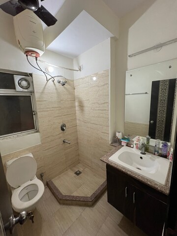 Bathroom in 3 BHK Apartment at Moti Nagar – for Rent