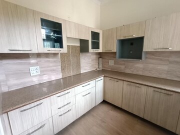 Kitchen in 4 BHK Apartment at RWA Surya Vihar, Sector 21 – for Rent