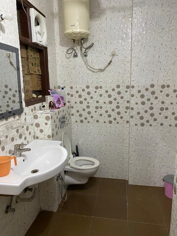 Bathroom in 3 BHK Apartment at Relaxo Apartment, Sector 46 – for Rent