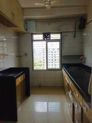 Kitchen in 1 BHK Apartment at Amar Jyoti Tower, Borivali West – for Sale