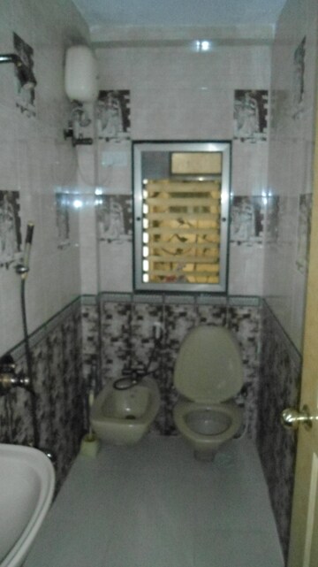 Bathroom in 2 BHK Apartment at Triveni CHS Andheri, Andheri West – for Rent