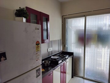 Kitchen in 2 BHK Apartment at Courtyard by Narang Realty and The Wadhwa Group, Pokhran Road No Two – for Rent