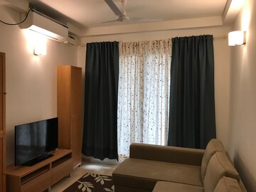 Living Room in 1.5 BHK Apartment at Bhartiya Nikoo Homes Phase 2, Thanisandra Main Road – for Rent