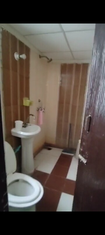 Bathroom in 3 BHK Apartment at Meenal Balmukund Residency, Raj Nagar Extension – for Sale