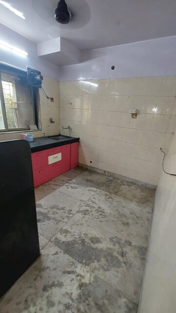 Kitchen in 2 BHK Apartment at Charkop Kesar CHS, Kandivali West – for Rent