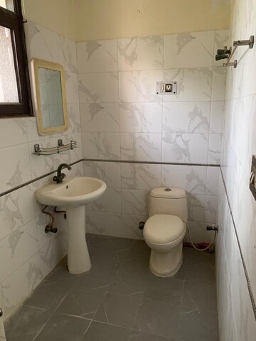 Bathroom in 1.5 BHK Independent House at RWA Apartments Sector 27, Sector 27 – for Rent