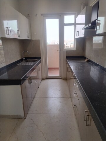 Kitchen in 3.5 BHK Apartment at Rishita Manhattan, Gomti Nagar – for Rent
