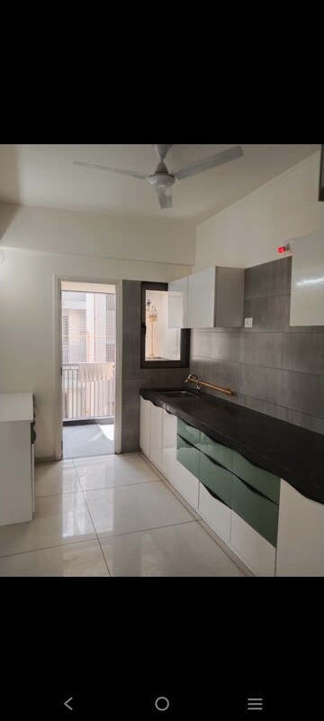 Kitchen in 4 BHK Apartment at Gala Orchid Sky, Shela – for Rent