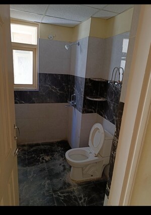 Bathroom in 2 BHK Apartment at SVP Gulmohur Garden, Raj Nagar Extension – for Sale