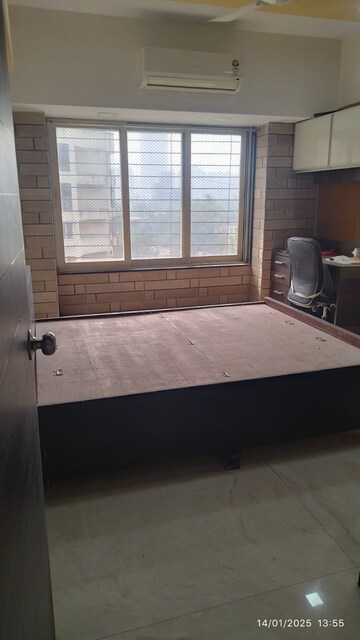 Bedroom in 2 BHK Apartment at Bhoomi Rock Avenue, Kandivali West – for Sale