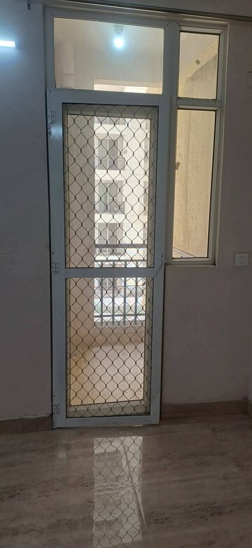 Building Lobby in 2 BHK Apartment at Amrapali Golf Homes, Sector 4 Greater Noida – for Sale