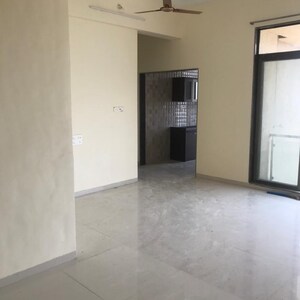 Room in 2 BHK Apartment at Platinum Liviano, Karanjade – for Sale