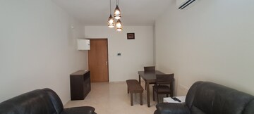 Living Room in 1 BHK Apartment at Godrej The Trees, Vikhroli East – for Rent