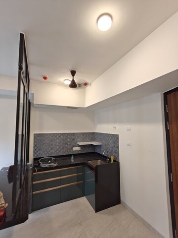 Kitchen in 1 BHK Apartment at Lodha Crown Quality Homes, Majiwada – for Rent