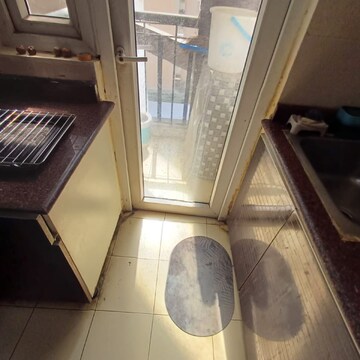 Kitchen in 3 BHK Apartment at Amrapali Zodiac, Sector 120 – for Sale