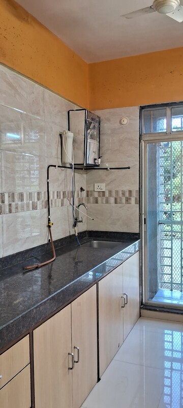 Kitchen in 2 BHK Apartment at Seasons Lakeview CHS, Kopar Khairane – for Rent