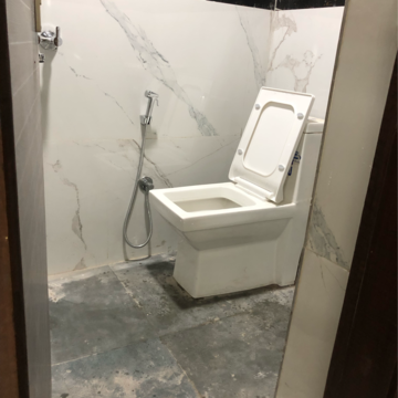 Bathroom in 1 BHK Apartment at Palm Residency Chhatarpur, Rajpur Khurd Extension – for Rent