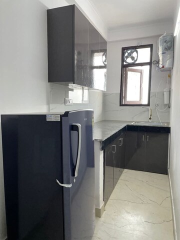 Kitchen in 1 BHK Builder Floor at Freedom Fighters Enclave – for Rent