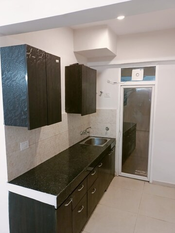 Kitchen in 2 BHK Apartment at Signature Global The Millennia, Sector 37d – for Rent