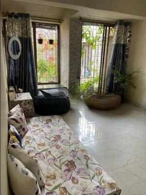 Living Room in 1 BHK Apartment at Golds Green Apartment, Andheri West – for Sale