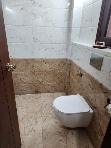 Bathroom in 3 BHK Apartment at Milan CGHS, Sector 39 – for Rent