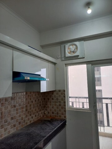 Kitchen in 2 BHK Apartment at Panchsheel Greens, Sector 16 Greater Noida – for Rent