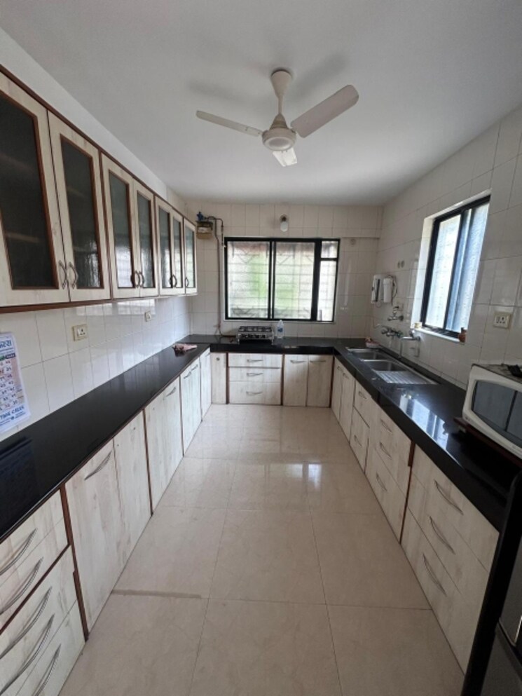 Kitchen, colonial-hearth 3 Bedroom 1350 Sq.Ft. Apartment In Model Colony Pune 8630900