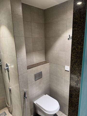 Bathroom in Studio Apartment at AIPL Joy Street, Sector 66 – for Rent
