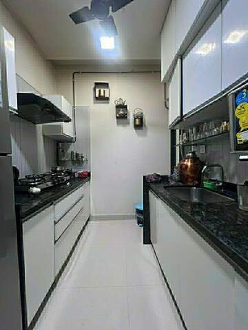 Kitchen in 2.5 BHK Apartment at Oberoi Realty Woods, Goregaon East – for Rent