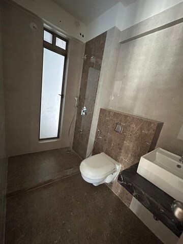 Bathroom in 3 BHK Apartment at Rajesh Raj Infinia, Malad West – for Rent