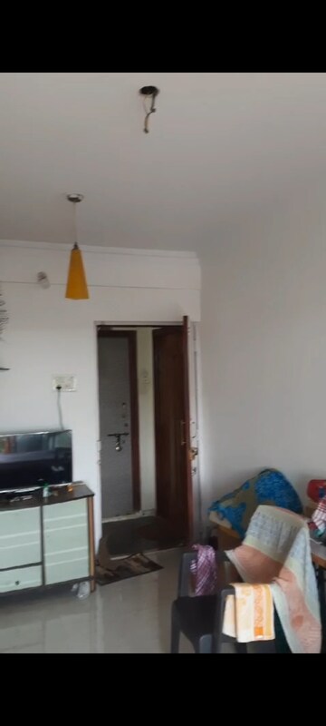 Living Room in 1 BHK Apartment at Gokhale Shantidoot CHS, Charkop Gaon – for Sale