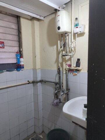 Bathroom in 2 BHK Apartment at Samridhi CHS, Dadar West – for Rent