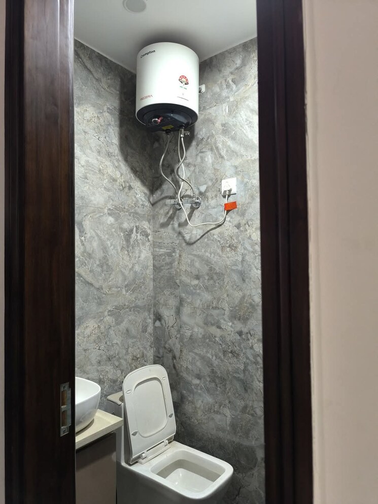 Bathroom, himagiri-enclave 2 Bedroom 450 Sq.Ft. Apartment In Burari Delhi 8631680
