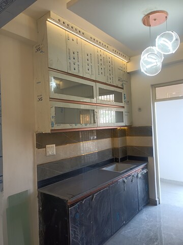 Kitchen in 2 BHK Apartment at Devika Skypers, Raj Nagar Extension – for Sale
