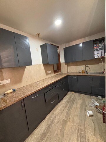 Kitchen in 2 BHK Builder Floor at Freedom Fighters Enclave – for Rent