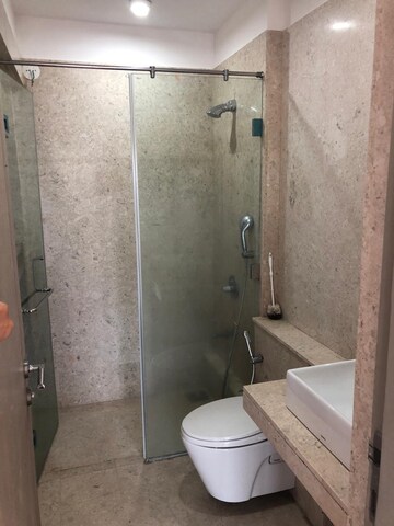 Bathroom in 1 BHK Apartment at Kanakia Rainforest, Andheri East – for Rent