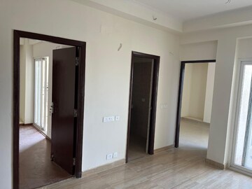 Building Lobby in 2 BHK Apartment at Amrapali Terrace Homes, Tech Zone 4 Greater Noida – for Rent