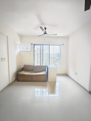 Living Room in 1 BHK Apartment at Terraform Everest Countryside Daffodil, Ghodbunder Road – for Sale