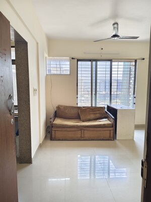 Living Room in 1 BHK Apartment at Terraform Everest Countryside Daffodil, Ghodbunder Road – for Sale