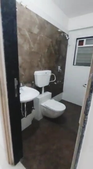 Bathroom in 1 BHK Apartment at Charms Global City, Ambernath East – for Sale