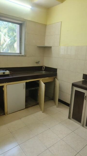 Kitchen in 1.5 BHK Apartment at Nav Ratan CHS, Santacruz East – for Rent