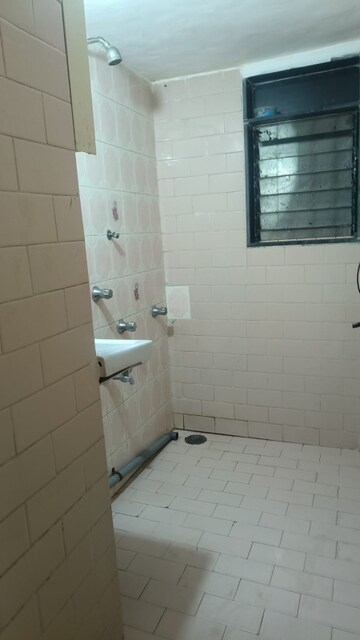 Bathroom in 1.5 BHK Apartment at Nav Ratan CHS, Santacruz East – for Rent