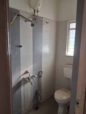 Bathroom in 2 BHK Apartment at Windsor Maple Woodz, Wagholi – for Sale