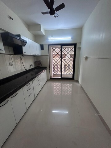 Kitchen in 3 BHK Apartment at Lakshachandi Heights, Goregaon East – for Rent