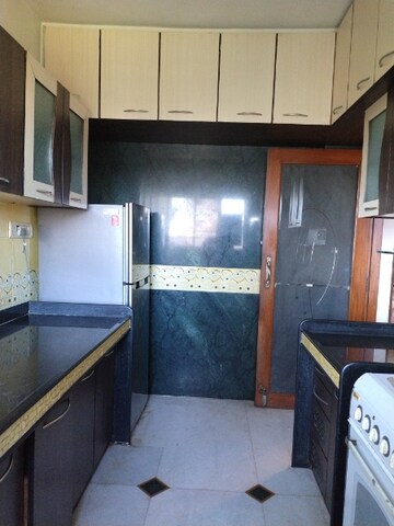 Kitchen in 2 BHK Apartment at Vasant Prakash CHS, Versova – for Rent